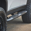 Load image into Gallery viewer, Rough Country Oval Nerf Steps | Black | Toyota Land Cruiser 4WD (2024-2025) - Installation View