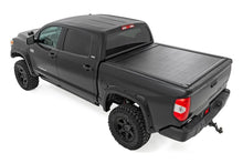Load image into Gallery viewer, Rough Country Powered Retractable Bed Cover | 5'7" Bed | Toyota Tundra (07-21) 51419550 - Back View