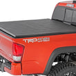Load image into Gallery viewer, Rough Country Soft Tri-Fold Bed Cover | 5' Bed | Dbl Cab | Toyota Tacoma 2WD/4WD (16-26) - Back View