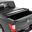 Load image into Gallery viewer, Rough Country Soft Tri-Fold Bed Cover | 5'7" Bed | Nissan Titan 2WD/4WD (2017-2024) - Side View