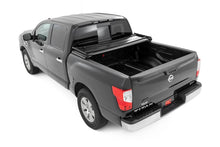 Load image into Gallery viewer, Rough Country Soft Tri-Fold Bed Cover | 5'7" Bed | Nissan Titan 2WD/4WD (2017-2024) - Installation View