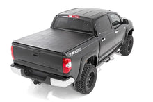 Load image into Gallery viewer, Rough Country Soft Tri-Fold Bed Cover | 5'7" Bed | No OE Rail | Toyota Tundra (07-26) - Side View
