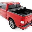 Load image into Gallery viewer, Rough Country Soft Tri-Fold Bed Cover | 5'7" Bed | Ram 1500 (19-25)/1500 TRX (21-24) 41307550 - Side View