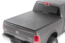 Load image into Gallery viewer, Rough Country Soft Tri-Fold Bed Cover | 5'7" Bed | Ram 1500 2WD/4WD (2009-2018 &amp; Classic) - Main Product View
