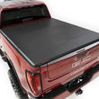 Load image into Gallery viewer, Rough Country Soft Tri-Fold Bed Cover | 6'9" Bed | Chevy/GMC 2500HD/3500HD (20-26) - Side View