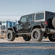 Load image into Gallery viewer, Rough Country Spare Tire Carrier Spcr | Jeep Wrangler JK/Wrangler TJ/Wrangler Unlimited 1053 - Installation View