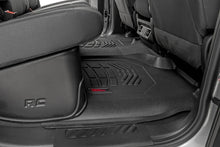 Load image into Gallery viewer, Rough Country Sure-Fit Floor Mats | FR &amp; RR | FR Over Hump | Crew | Chevy/GMC 1500/2500HD/3500HD (19-26) - Installation View