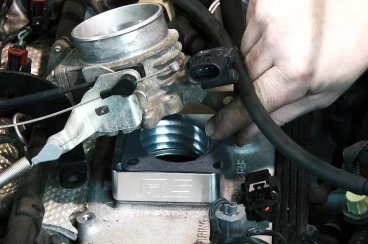 Rough Country Throttle Body Spacer | Jeep Cherokee XJ/Comanche MJ/Wrangler TJ 1068 - Installation View