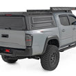 Load image into Gallery viewer, Rough Country Truck Bed Cap | Modular | 5' Bed | Toyota Tacoma 2WD/4WD (2016-2023) - Back View