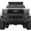 Load image into Gallery viewer, Rough CountryHidden Winch Mount | White SAE | PRO9500S | Toyota Land Cruiser 4WD (24-25)10751 - Installation View