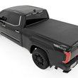 Load image into Gallery viewer, Rough CountrySoft Tri-Fold Bed Cover | 5'7" Bed | with and w/o OE Rail | Toyota Tundra (22-25)41419560A - Back View