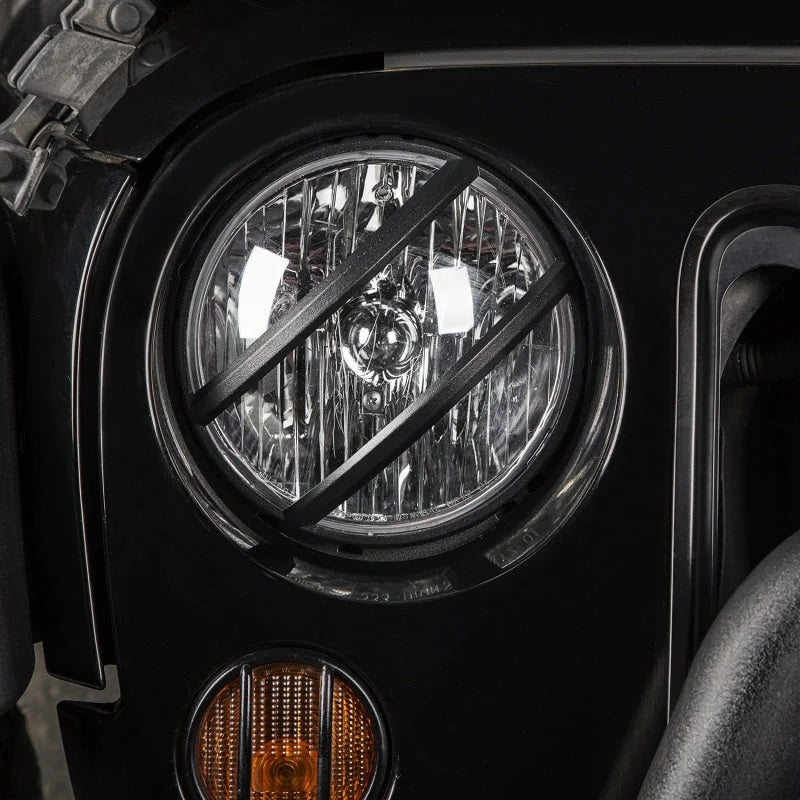 Rugged Ridge 07-18 Jeep Wrangler JK Black Elite Pivotal Headlight Euro Guard - Side View