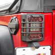 Load image into Gallery viewer, Rugged Ridge 07-18 Jeep Wrangler JK Black Elite Tail Light Guards - Side View