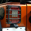 Load image into Gallery viewer, Rugged Ridge 07-18 Jeep Wrangler Textured Black Tail Light Euro Guards - Side View
