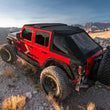 Load image into Gallery viewer, Rugged Ridge 2018+ Jeep Wrangler JLU 4 Dr Black Diamond Stitch Cloth Voyager Top (Tinted) - Back View