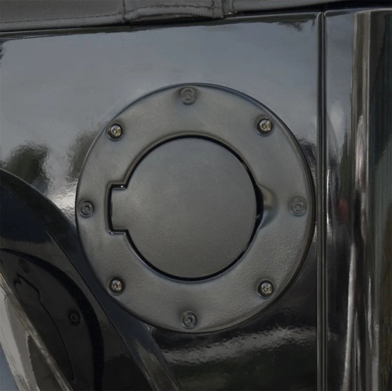 Rugged Ridge 97-06 Jeep Wrangler TJ Black Non-Locking Gas Cap Door - Side View