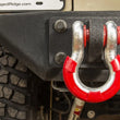 Load image into Gallery viewer, Rugged Ridge Red 3/4in D-Ring Isolator Kit - Side View