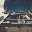 Load image into Gallery viewer, RustBuster Rear Shock Crossmember fits Gm Pick Up Trucks - Back View