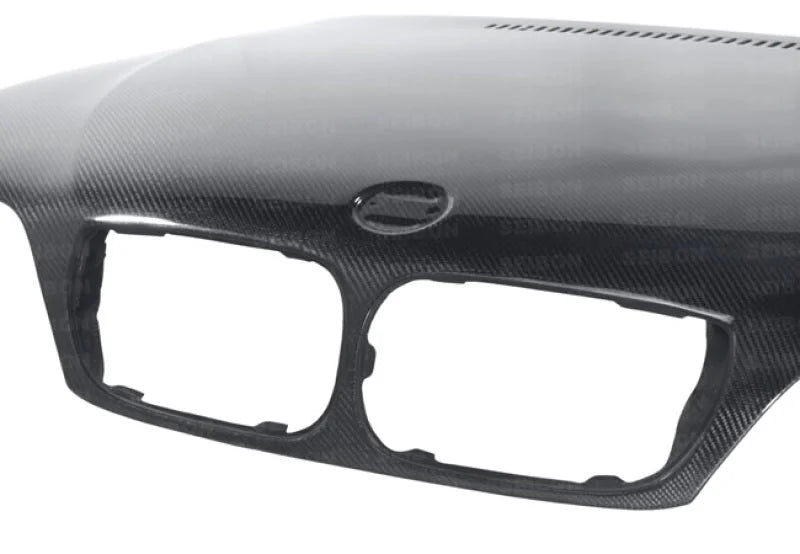 Seibon 02-05 BMW 3 Series 4dr E46 (Manuf Date 7/02-7/06 Models Only) OEM-Style Carbon Fiber Hood - Back View