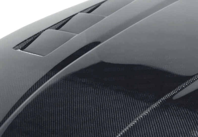 Seibon 02-06 Nissan 350Z TS Carbon Fiber Hood - Side View