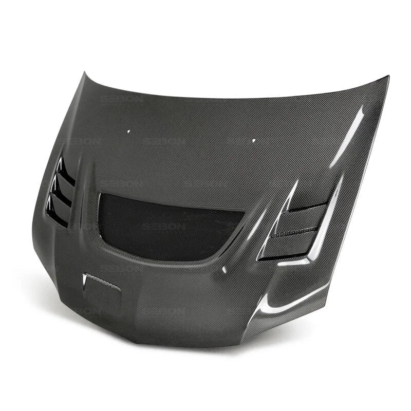 Seibon 03-07 Mitsubishi Evo 8 & 9 CW Carbon Fiber Hood - Side View
