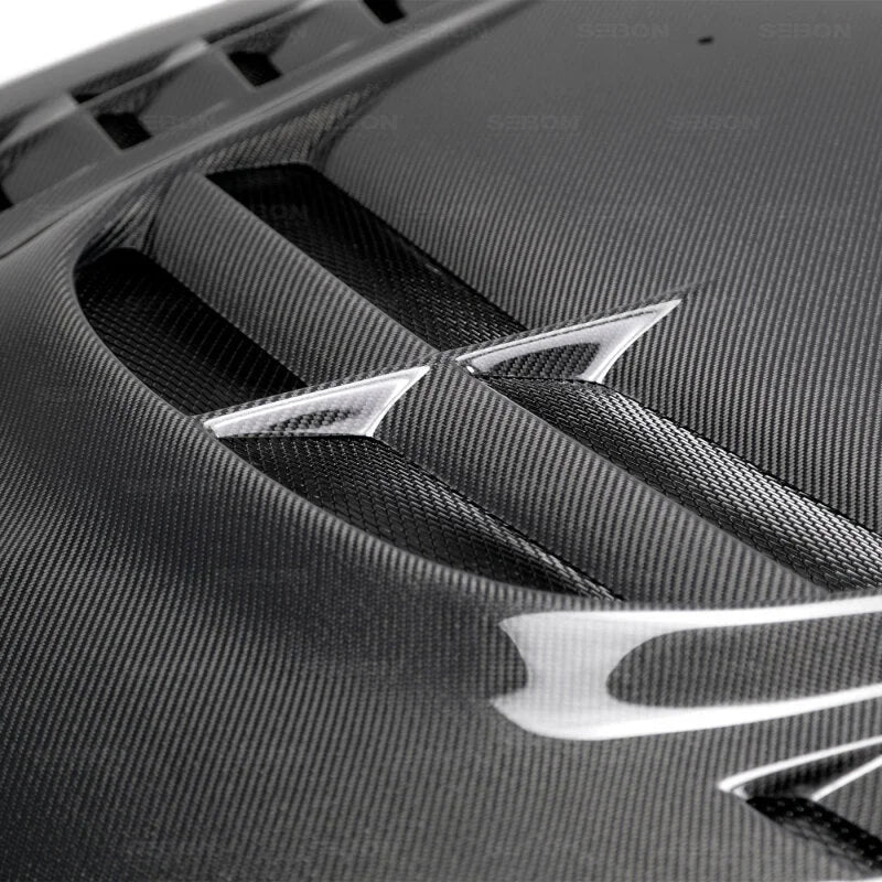 Seibon 03-07 Mitsubishi Evo 8 & 9 CW II Carbon Fiber Hood - Installation View