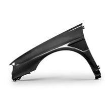 Load image into Gallery viewer, Seibon 04-05 Subaru WRX/STi 10mm Wider Carbon Fiber Fenders - Side View