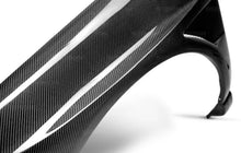 Load image into Gallery viewer, Seibon 04-05 Subaru WRX/STi 10mm Wider Carbon Fiber Fenders - Additional View 5