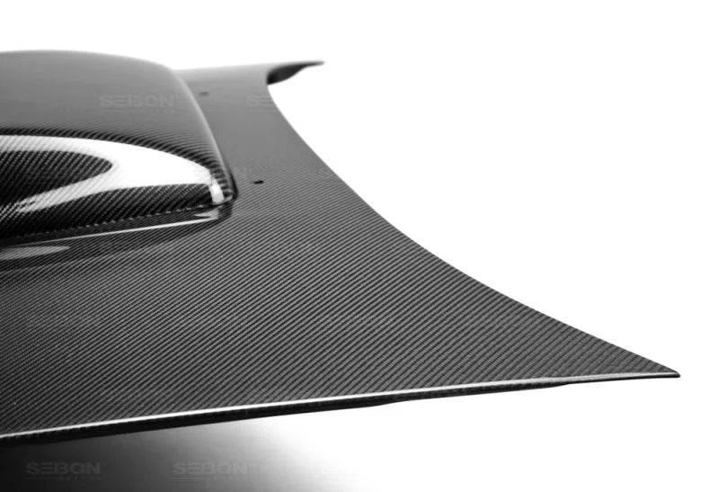 Seibon 04-05 Subaru WRX/STi RC Carbon Fiber Hood - Main Product View