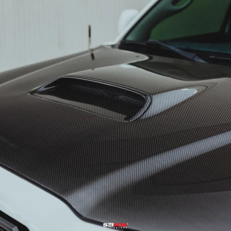 Seibon 05-11 Toyota Tacoma TR-Style Carbon Fiber Hood - Main Product View