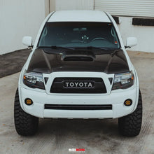 Load image into Gallery viewer, Seibon 05-11 Toyota Tacoma TR-Style Carbon Fiber Hood - Additional View 5