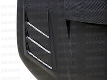 Load image into Gallery viewer, Seibon 06-07 Subaru WRX/STi CWII Carbon Fiber Hood - Installation View