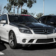 Load image into Gallery viewer, Seibon 07-10 Mercedes Benz C-Class (AMG 63 ONLY) GT-Style Carbon Fiber Hood - Installation View
