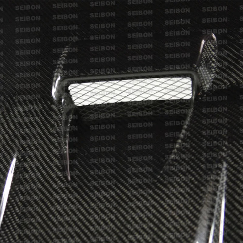 Seibon 08-09 Mitsubishi Lancer (CYA4/5A) DV Style Carbon Fiber Hood - Side View