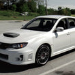 Load image into Gallery viewer, Seibon 08-10 Subaru Impreza WRX STI CWIII-Style CF Hood Scoop - Only Fits OEM Hood (Not Seibon Hood) - Installation View