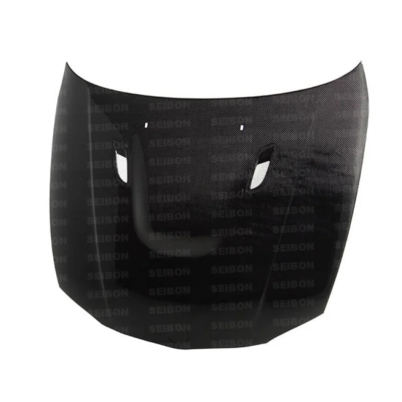 Seibon 08-11 BMW 1 Series (E81/E82) 2DR/HB BM Carbon Fiber Hood - Side View