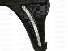 Load image into Gallery viewer, Seibon 08-12 Mitsubishi Evo X 10mm Wider Carbon Fiber Fenders - Main Product View