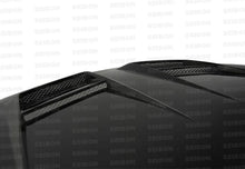 Load image into Gallery viewer, Seibon 10-11 VW Golf GTI 5K/MK6 DV Carbon Fiber Hood w/ Shaved Emblem - Main Product View