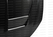 Load image into Gallery viewer, Seibon 10-11 VW Golf GTI 5K/MK6 DV Carbon Fiber Hood w/ Shaved Emblem - Side View