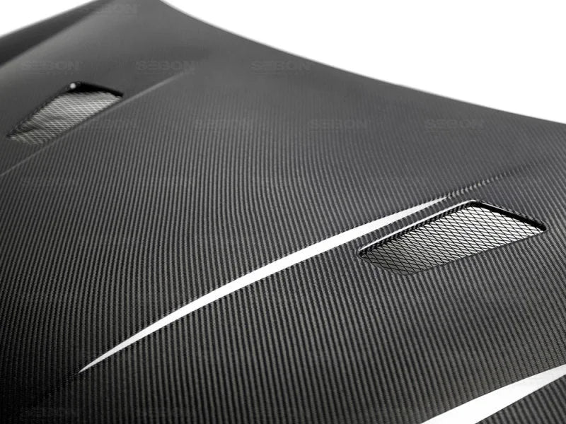 Seibon 10-11 VW Golf GTI 5K/MK6 TM Carbon Fiber Hood w/ Shaved Emblem - Main Product View