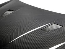 Load image into Gallery viewer, Seibon 10-11 VW Golf GTI 5K/MK6 TM Carbon Fiber Hood w/ Shaved Emblem - Main Product View