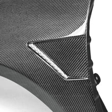 Load image into Gallery viewer, Seibon 10-12 Volkswagen Golf Carbon Fiber Fenders - Wide - Installation View