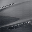 Load image into Gallery viewer, Seibon 10-13 BMW 5 Series and M5 Series (F10) BT-Style Carbon Fiber Hood - Side View