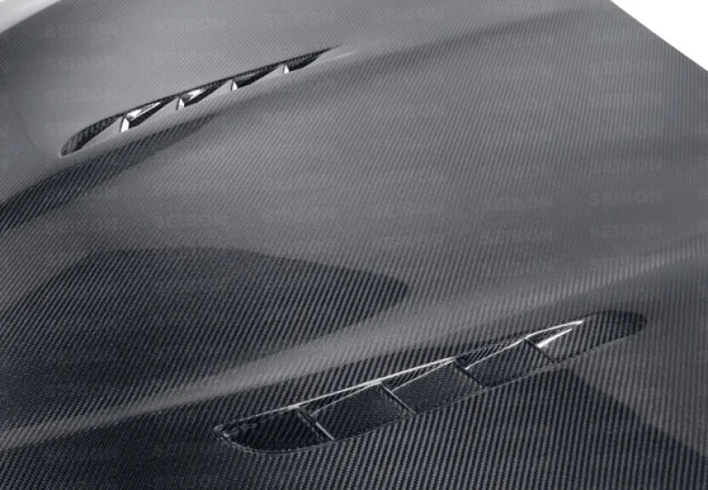 Seibon 10-13 BMW 5 Series and M5 Series (F10) BT-Style Carbon Fiber Hood - Side View