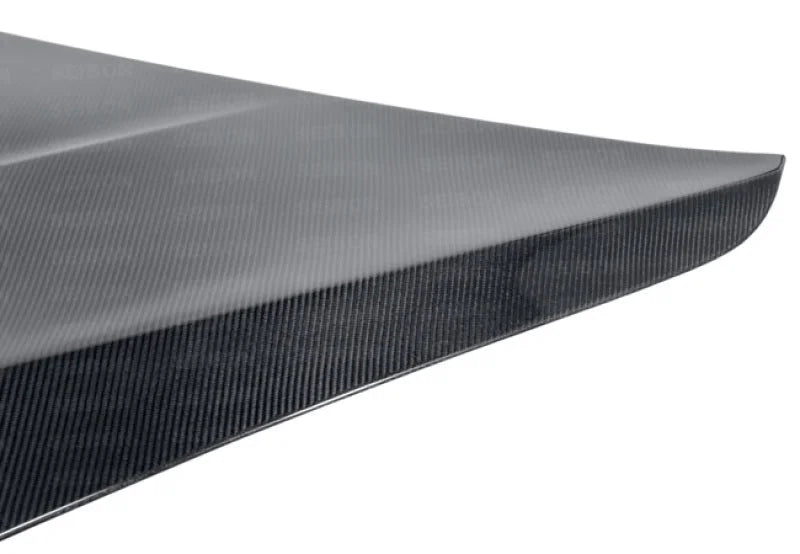 Seibon 10-13 BMW 5 Series and M5 Series (F10) OEM-Style Carbon Fiber Hood - Side View