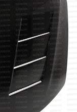 Load image into Gallery viewer, Seibon 11-13 Scion tC (AGT20L) TS-style Carbon Fiber Hood (Does not fit 14) - Side View