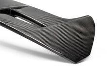 Load image into Gallery viewer, Seibon 11-15 Ford Fiesta (Hatchback) ST-Style Carbon Fiber Rear Spoiler - Installation View