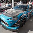 Load image into Gallery viewer, Seibon 12-13 BRZ/FRS DV Carbon Fiber Hood - Installation View