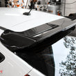 Load image into Gallery viewer, Seibon 12-13 Ford Focus OEM Style Carbon Fiber Rear Spoiler - Side View