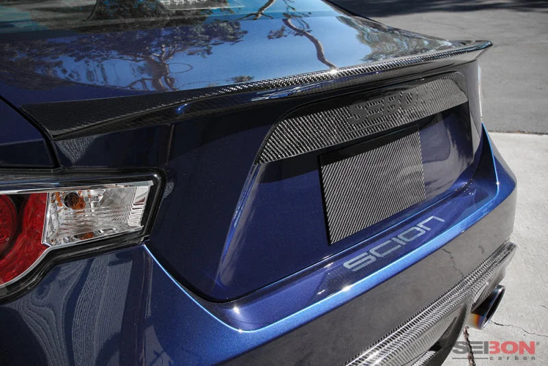 Seibon 12-14 Subaru BRZ / Scion FRS Carbon Fiber Rear Trunk Garnish - Side View
